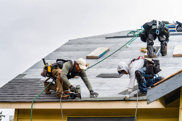Professional Gutter Installation technician working in Fort Rock, OR